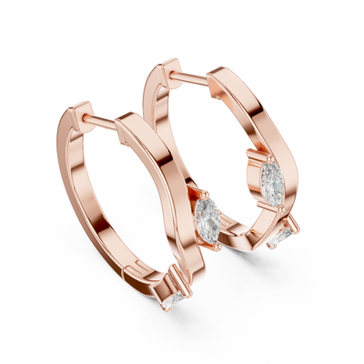 Side profile of rose gold sculptural fluid line diamond hoop earrings.