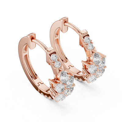 Side profile of rose gold floral huggie hoop diamond earrings.