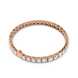 Rose gold bracelet with diamonds on a white background