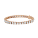 Rose gold bracelet with clear gemstones on a white background