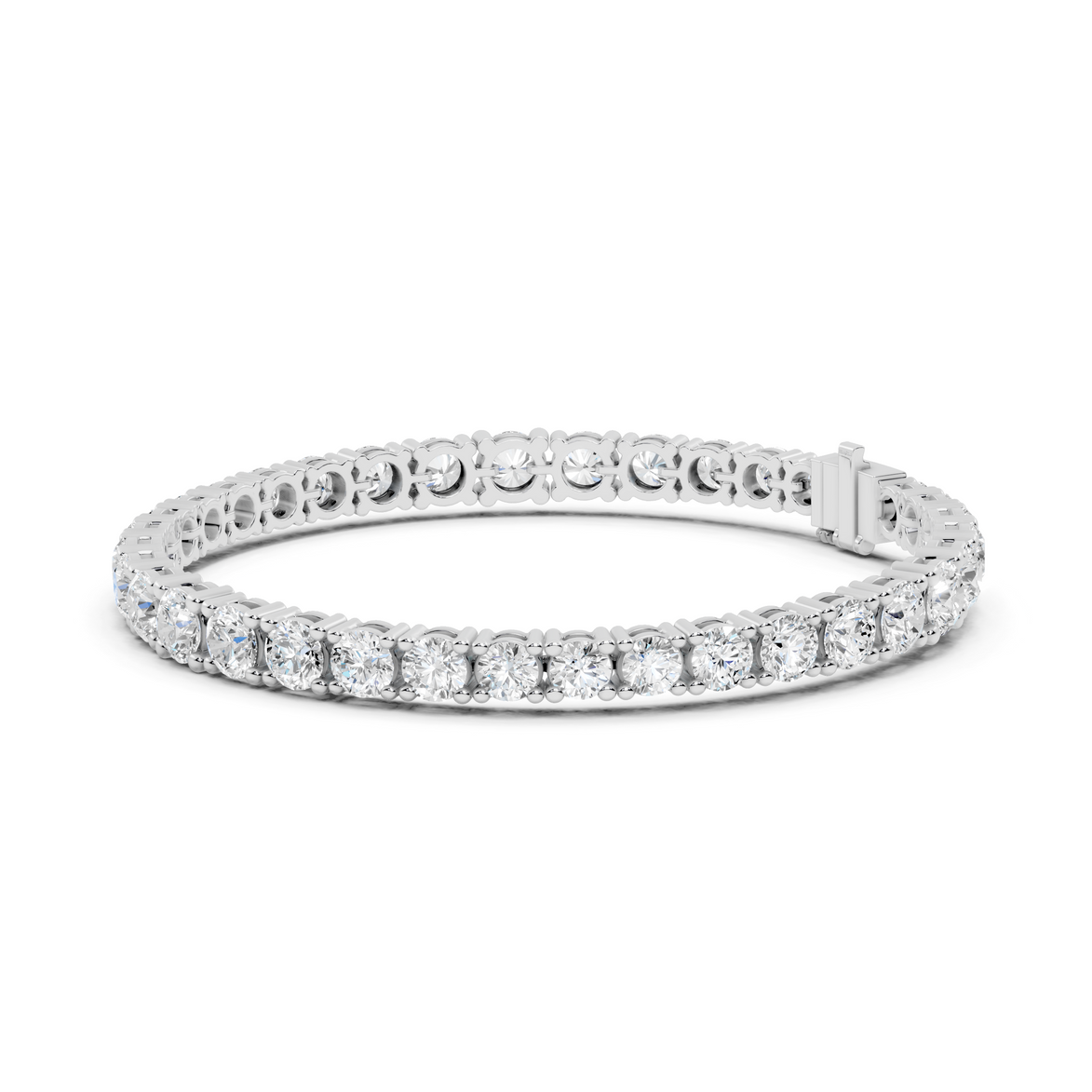 Silver bracelet with clear stones on a white background