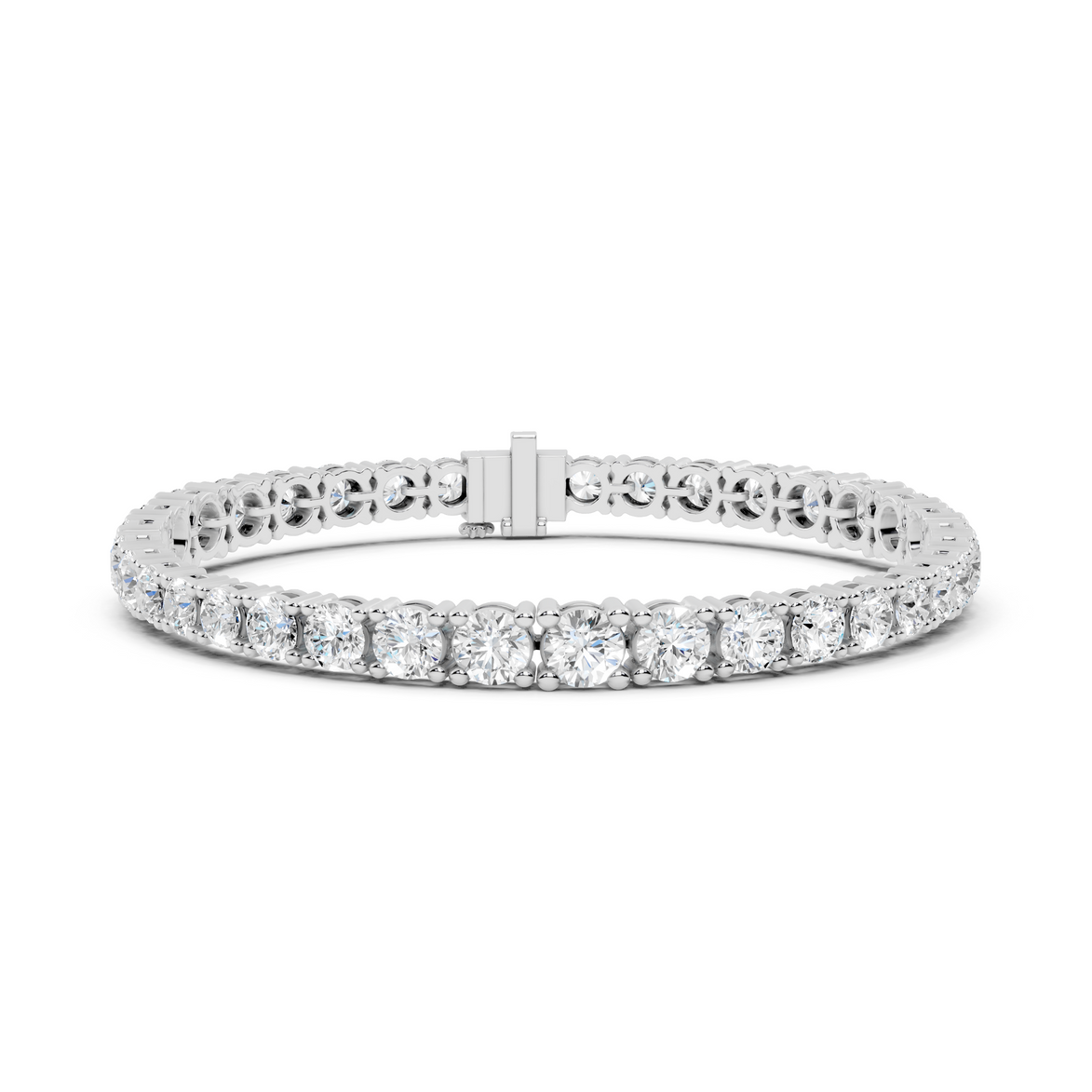 Silver bracelet with clear gemstones on a white background