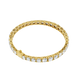 Gold bracelet with diamond accents on a white background