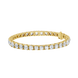 Gold bracelet with clear gemstones on a white background