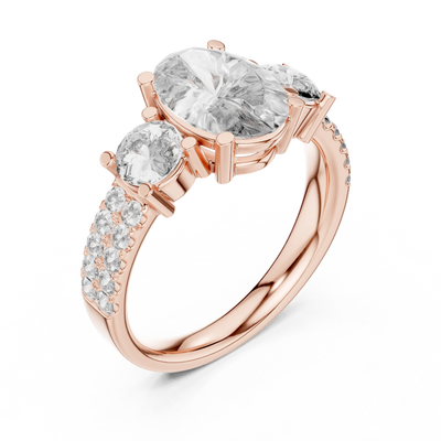 oval diamond graduated side-stone ring in rose gold
