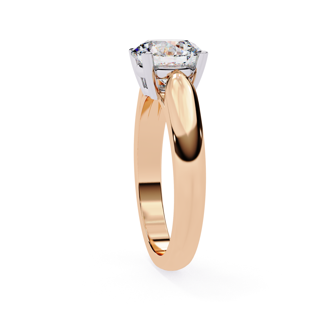 Gold ring with a diamond on a white background