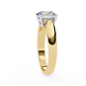 Gold ring with a diamond on a white background