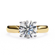 Gold ring with a large diamond on a white background