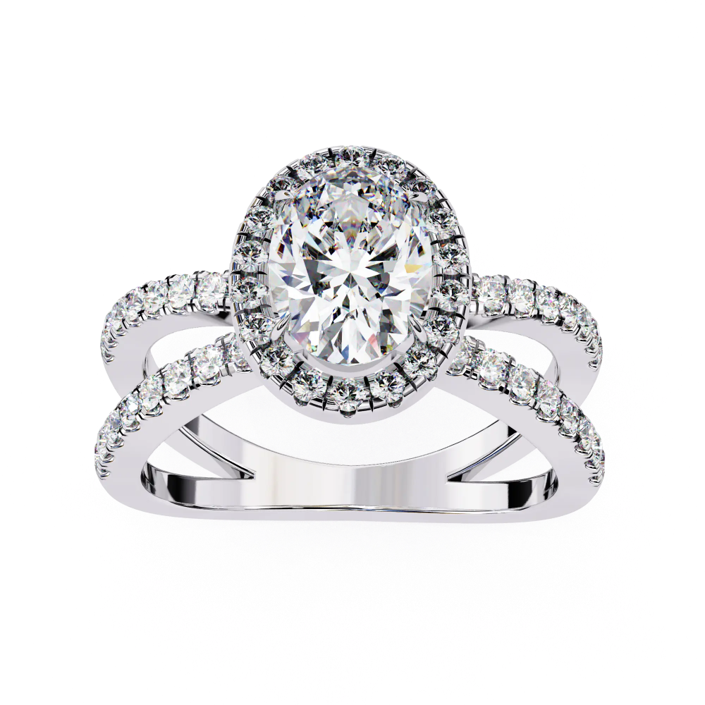 Diamond ring with a halo and intricate design on a white background