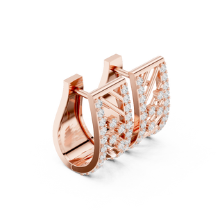 Side profile of rose gold geometric diamond hoop earrings highlighting the  curved architectural silhouette.