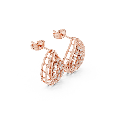 Side profile of the rose gold feather-inspired diamond stud earrings