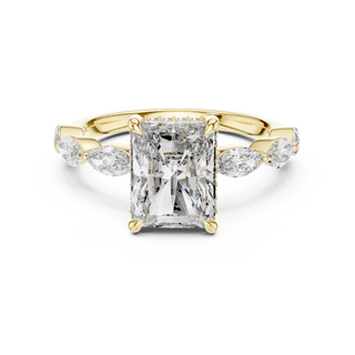 radiant diamond marquise engagement ring in yellow gold
