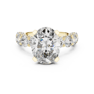 oval diamond round side-stone ring in yellow gold
