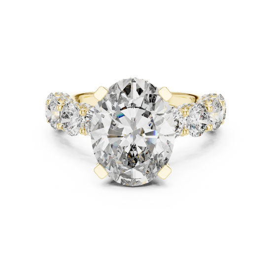 oval diamond round side-stone ring in yellow gold
