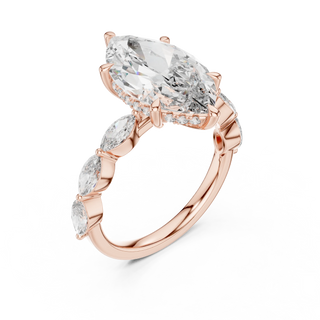 marquise diamond side-stone engagement ring in rose gold

