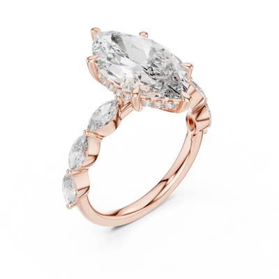 marquise diamond side-stone engagement ring in rose gold

