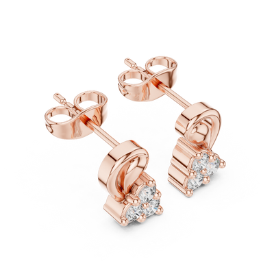 Side profile view of rose gold floral diamond studs