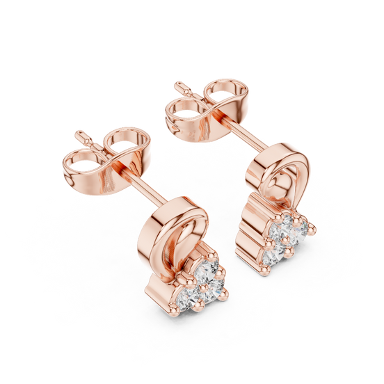 Side profile view of rose gold floral diamond studs