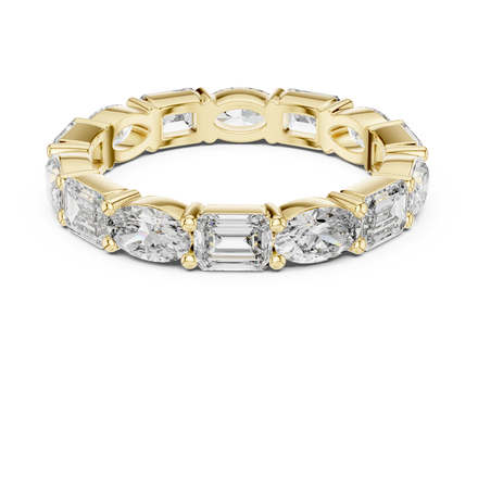 emerald and oval lab grown diamond eternity ring in yellow gold

