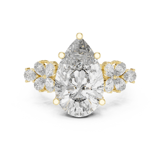 pear lab grown diamond floral cluster ring in yellow gold
