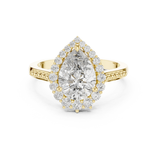 pear lab grown diamond graduated halo ring in yellow gold