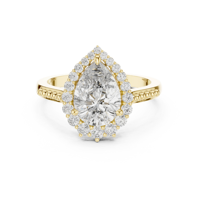 pear lab grown diamond graduated halo ring in yellow gold