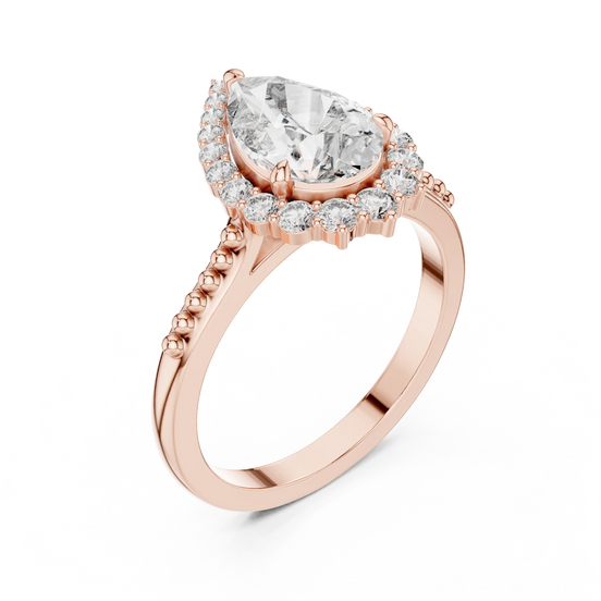 pear lab grown diamond graduated halo ring in rose gold