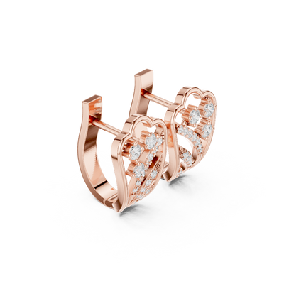 Side profile of the rose gold heart-inspired diamond earrings