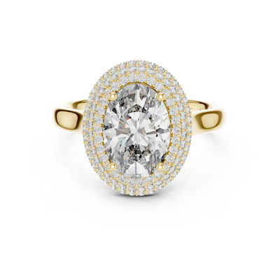 oval double halo diamond engagement ring in yellow gold
