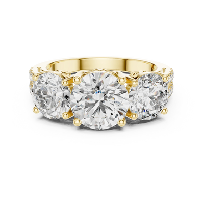 round scroll three-stone engagement ring in yellow gold
