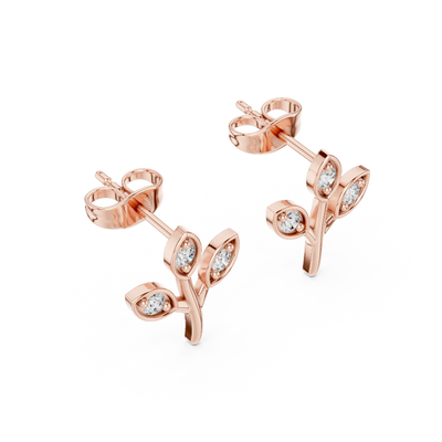 Side profile of the rose gold botanical branch stud earrings