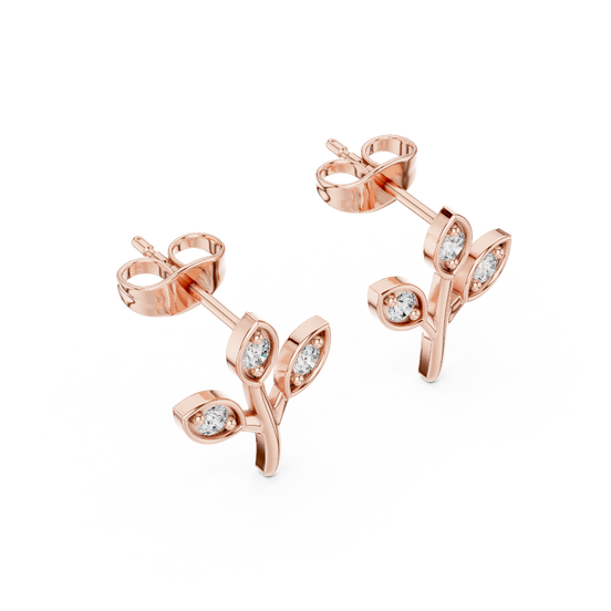 Side profile of the rose gold botanical branch stud earrings
