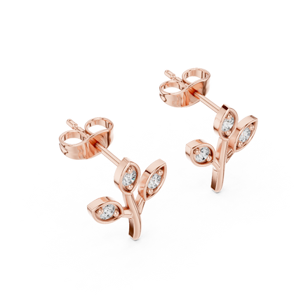 Side profile of the rose gold botanical branch stud earrings