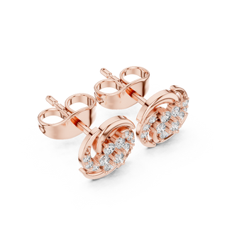 Side profile of the rose gold swirl floral stud earrings