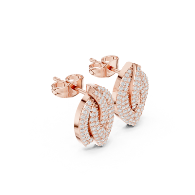 Side profile of the rose gold diamond leaf cluster earrings