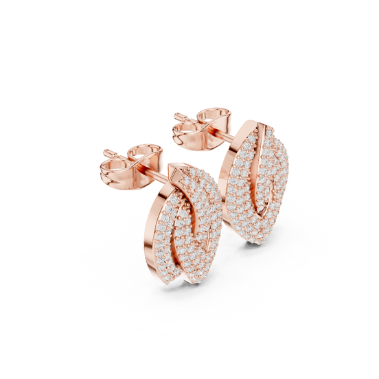 Side profile of the rose gold diamond leaf cluster earrings