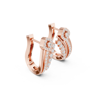 Side profile of the rose gold curved drop diamond earrings