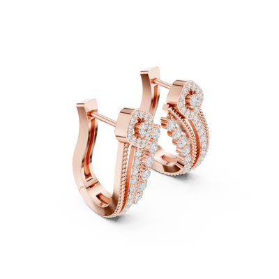 Side profile of the rose gold curved drop diamond earrings
