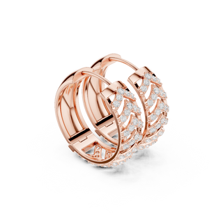 Side profile of the rose gold chevron diamond hoops