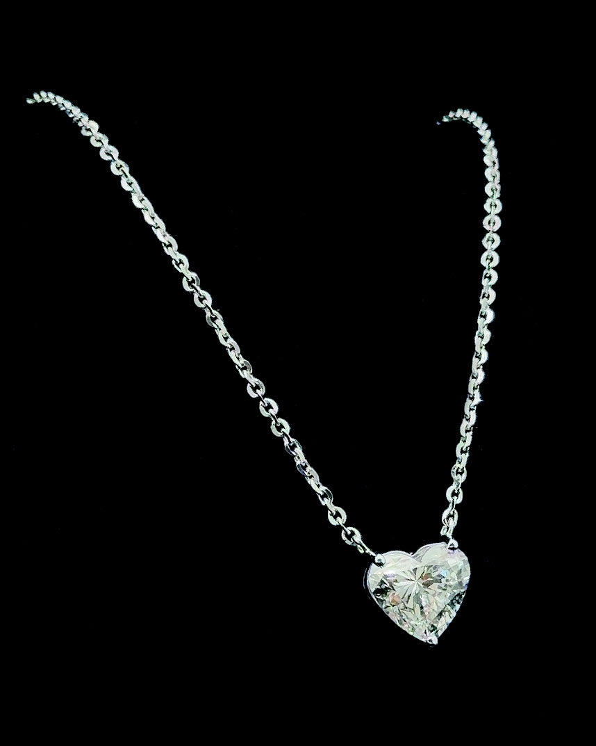 The Amoret heart-cut lab-grown diamond solitaire necklace in white gold on a black background