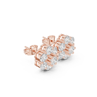 Side profile view of rose gold floral diamond stud earrings showing the secure push-back closure.