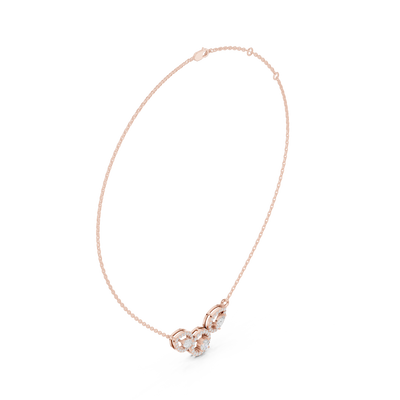 Minimal three stone diamond pendant in gold with pear and round lab grown diamonds by Signora Jewels