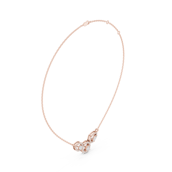 Minimal three stone diamond pendant in gold with pear and round lab grown diamonds by Signora Jewels