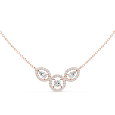 Minimal three stone diamond pendant in gold with pear and round lab grown diamonds by Signora Jewels