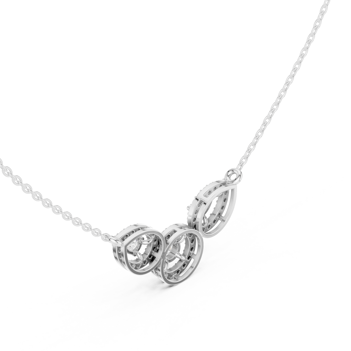 Minimal three stone diamond pendant in gold with pear and round lab grown diamonds by Signora Jewels