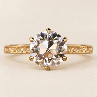Old European cut Lab Grown Diamond vintage engagement ring in yellow gold with a six-prong lotus basket and engraved milgrain band.