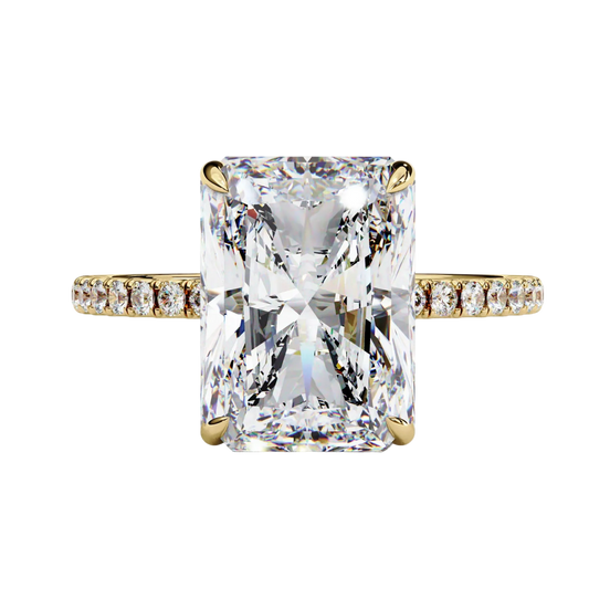 Front view of radiant cut diamond engagement ring in warm yellow gold.