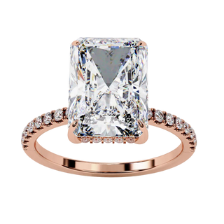 Profile view of rose gold ring highlighting elevated four-prong setting layout.