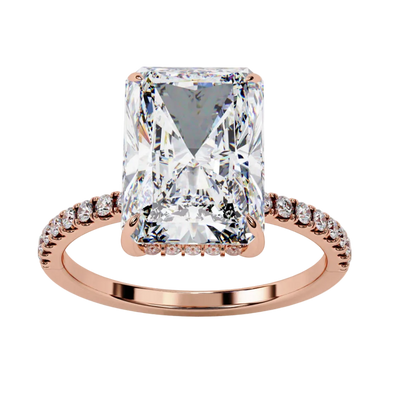 Profile view of rose gold ring highlighting elevated four-prong setting layout.