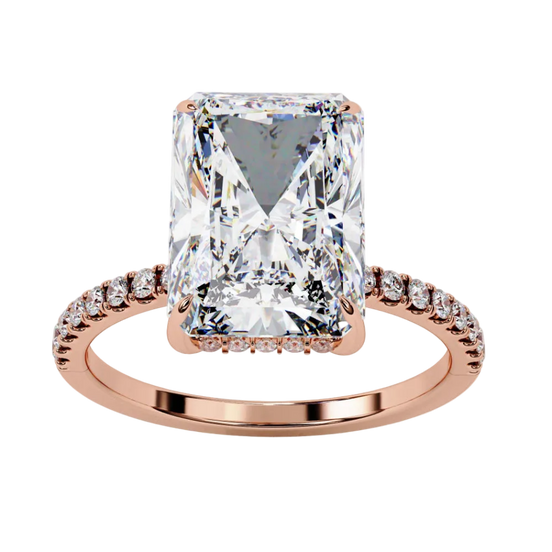 Profile view of rose gold ring highlighting elevated four-prong setting layout.